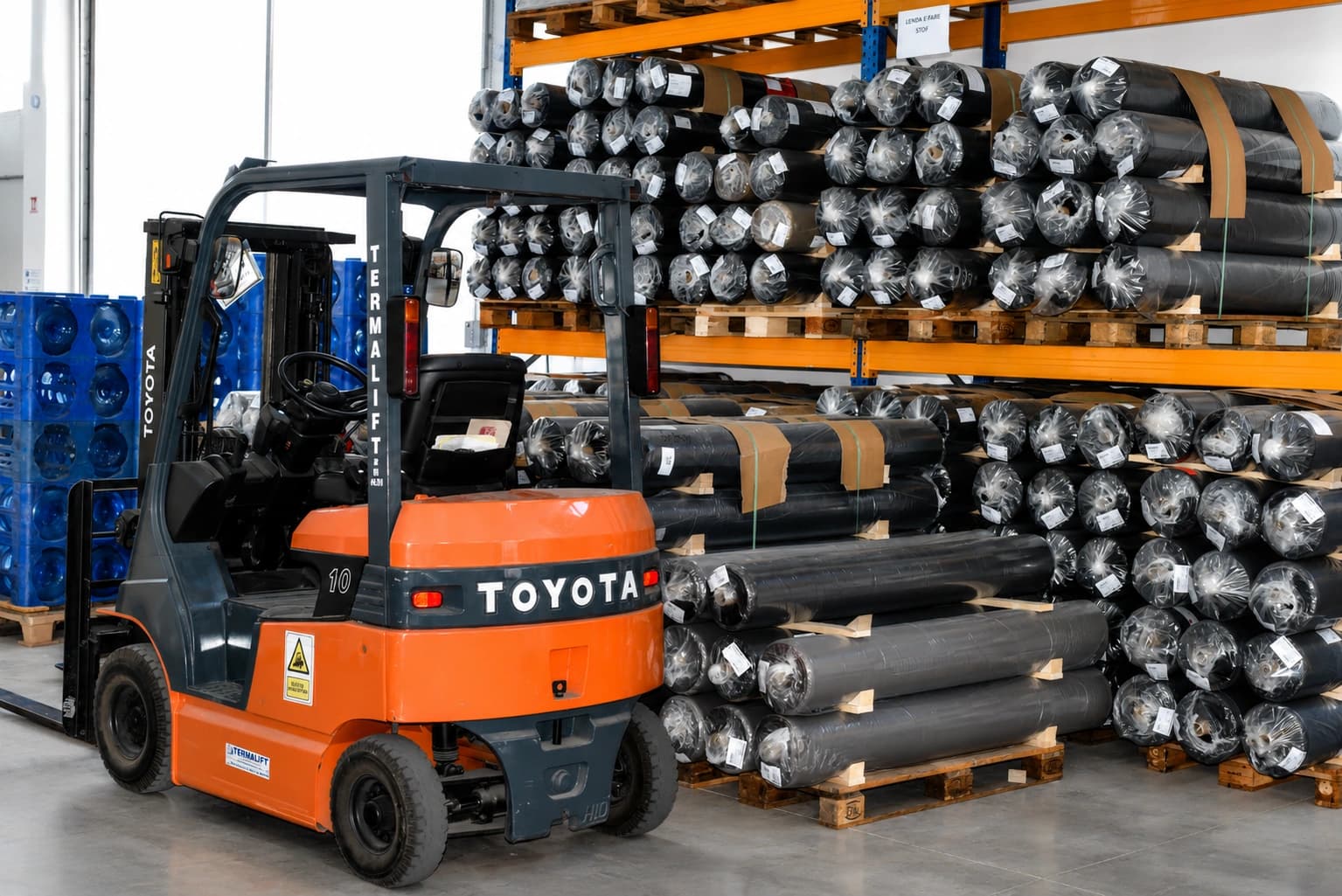 Technical fabric rolls racked in our warehouse