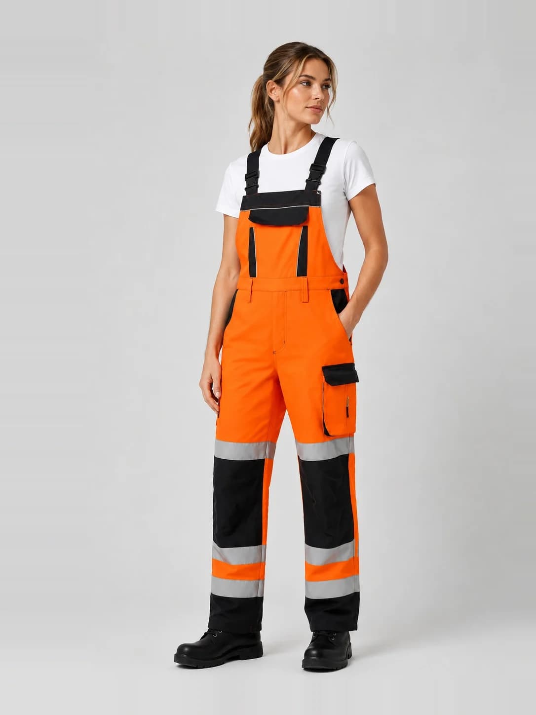 Hi-vis bib-and-brace overall with reflective bands and contrast knee panels